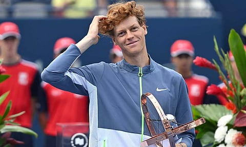 Jannik Sinner (ITA) holds the winner's trophy after defeating Alex De Minaur (AUS) (not pictured) during final-round play at Sobeys Stadium. (Reuters)