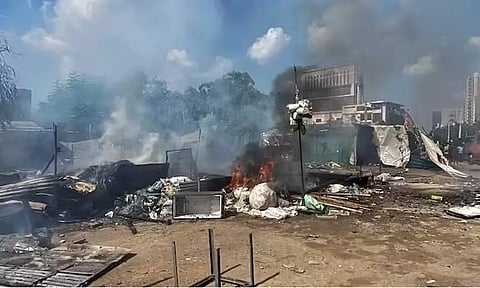 Several vehicles, food joints, and shops were set on fire by unruly mobs during the violence. (PTI)