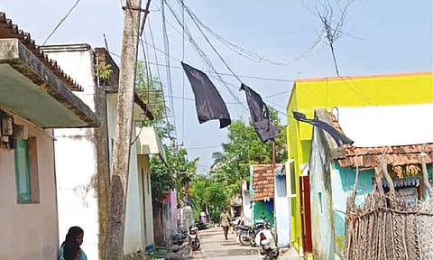 Black flags erected on houses on Tuesday on the occasion of Independence Day
