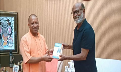Actor Rajinikanth with Yogi Adityanath. ANI