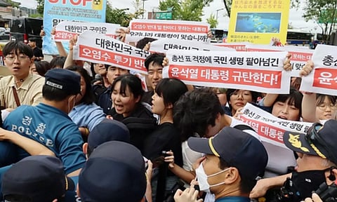 Protests outside embassy. IANS