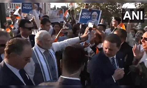 PM Modi interacts with Indian community outside hotel in Athens, Greece (ANI)