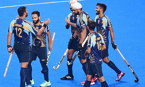 IOCL celebrates a goal against Indian Railways
