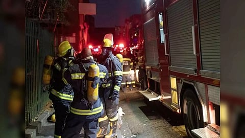 Firefighters work at the scene of a deadly blaze in the early hours of the morning, in Johannesburg, South Africa, on August 31, 2023 (Credit: Reuters)
