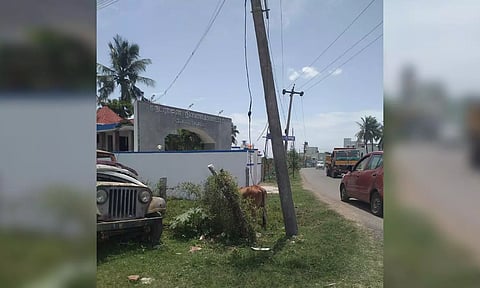 One of the EB poles in slanting position with wires running low in Vengadamangalam in Medavakkam area