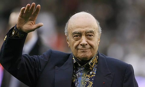 Fulham owner Mohamed Al Fayed waves to the crowd before the English Premier League soccer match against Tottenham Hotspur at Craven Cottage Stadium, London. (AP)