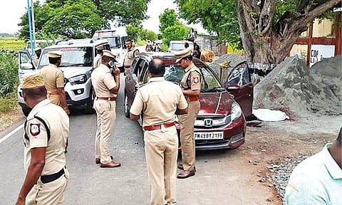 Police inspect the spot of murder in Tiruvarur on Tuesday