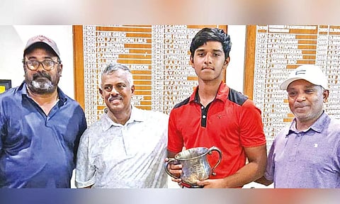 Pranav Nandakumar poses with the MRC Cup