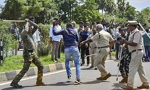 Police personnel lathi-charge TDP supporters protesting against the arrest of TDP chief Chandrababu Naidu.(PTI)