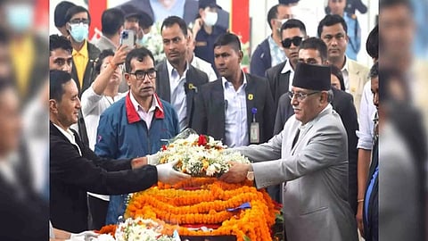Nepal PM Pushpa Kamal Dahal paying tribute to tribute to Subash Chandra Nembwang (Photo: Nepal PM Secretariat)