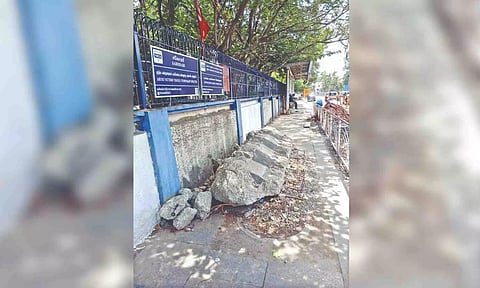 Construction debris dumped on the pavement