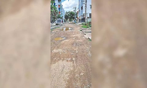 Potholes seen on the road in Susila Nagar