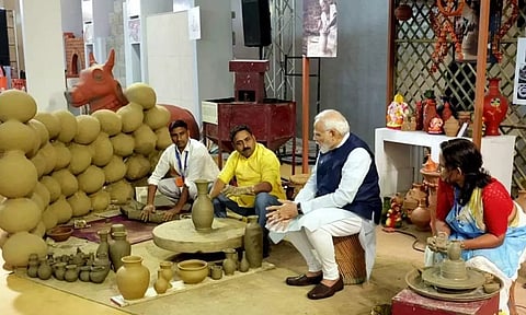 PM Modi visits an exhibition during the inauguration of the India International Convention and Expo Centre (IICC), in New Delhi. (PTI)