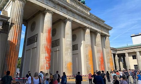 The spray-painted Brandenburg Gate. Reuters