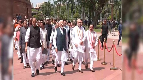 MPs walk toward new Parliament Building (Photo/ANI)