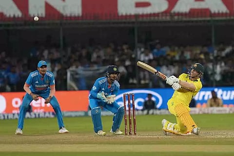 Australia's David Warner plays a shot during the second ODI cricket match between India and Australia, in Indore (PTI)