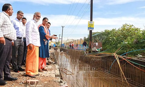 CMDA Minister PK Sekarbabu inspecting Kilambakkam terminus along with senior officials.