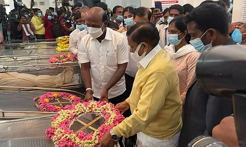 Health Minister Ma Subramanian pays floral tributes to the mortal remains of the nine victims, who died in Nilgiris bus accident.