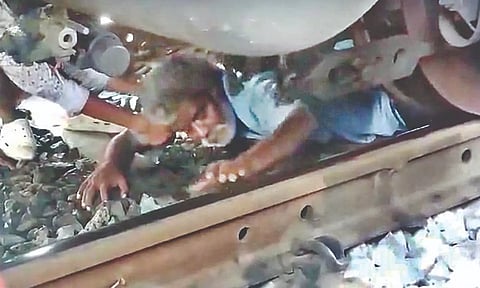 The elderly man crawled out of the train without as much as a scratch. 