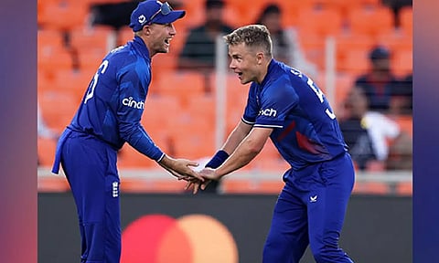 Sam Curran and Joe Root celebrating the fall of the only NZ wicket (ANI)