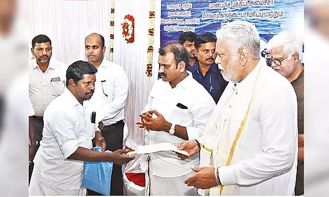 Parshottan Rupala and L Murugan receive petition from fishermen in Thanjavur on Saturday