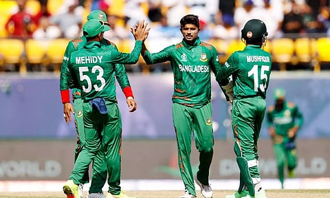 Bangladesh team players celebrating a wicket. (X)