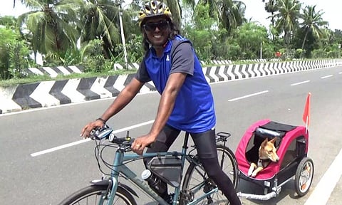 Sholinganallur’s Hari takes his pet on a sidecar while cycling on East Coast Road