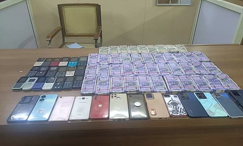 Cash, mobile phones seized following arrest of 8 persons