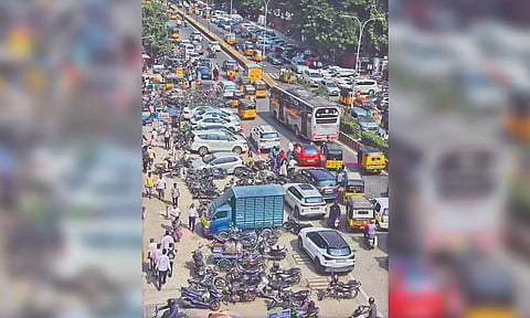 Though additional parking lots are very much needed in the city it would be a disadvantage for the hawkers, who would be shifted to other areas. (Photo credit: Hemanathan M) 
