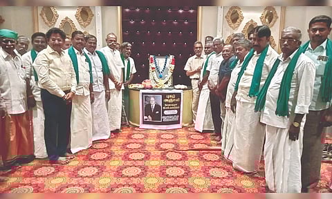 Delta farmers paying tributes to the portrait of MS Swaminathan in Thanjavur on Tuesday.