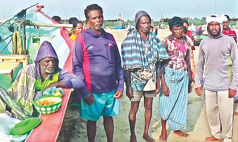 Injured fishers on the shore in Vedaranyam on Wednesday.