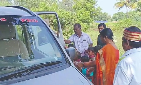 Collector Valarmathi sends students to school on PRO’s official vehicle on Friday.