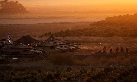 A formation of Israeli tanks is positioned near Israel's border with the Gaza Strip (Image: REUTERS)