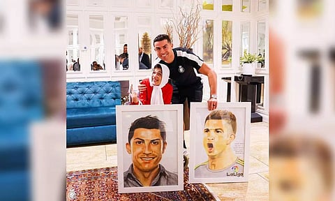  Cristiano Ronaldo with his fan Fatima Hamami