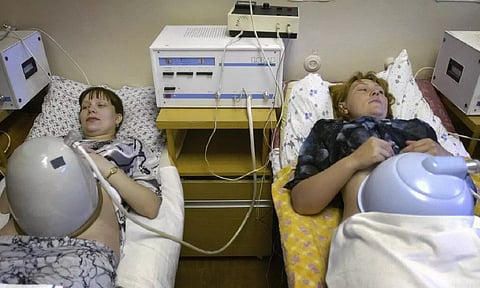Two pregnant women undergo an examination in the family planning centre in Yekatrinberg in Russia (AP)