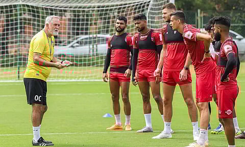Owen Coyle interacting with players ahead of Sunday’s fixture against Punjab FC