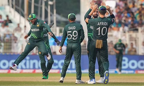 Pakistan players celebrating a wicket. (PTI)