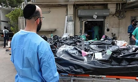 Bodies in bags waiting to be examined and identified in Tel Aviv (Photo: TPS)