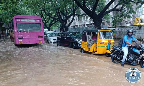 The Velachery-Guindy Road flooded for a few hours on Friday morning after moderate rain showers. (Photo credit: Justin George)