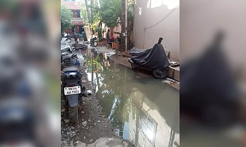 Overflowing sewage in a street in perambur
