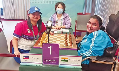Sharon (right) during a tournament in China