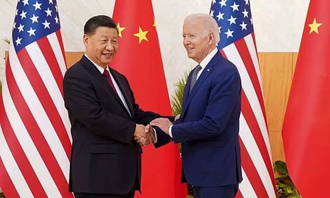 U.S. President Joe Biden shakes hands with Chinese President Xi Jinping as they meet on the sidelines of the G20 leaders' summit (Image: REUTERS)