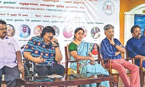 Manushyaputhiran, Chairperson of the Chennai Local Library Authority, delivers a talk at the inaugural session