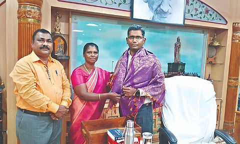 Fisherwoman Sunitha with Collector PN Sridhar