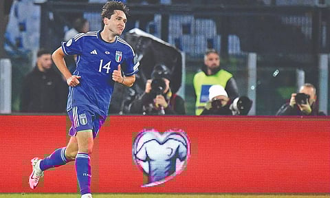 Federico Chiesa celebrates after scoring Italy’s third goal against North Macedonia