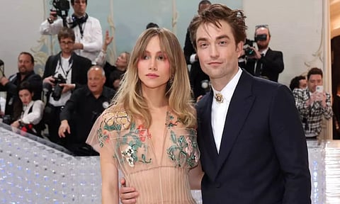 Robert Pattinson with Suki Waterhouse. (Reuters)