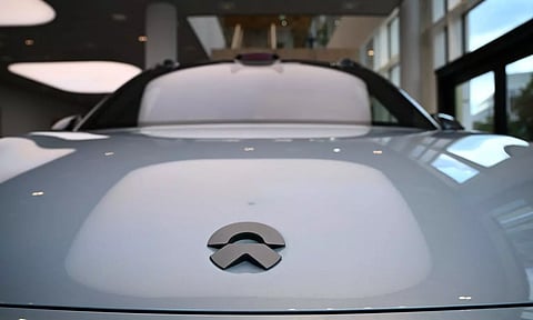 The logo of NIO seen on an EL6 car model is pictured at the NIO House (Photo: Reuters)