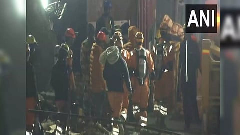 NDRF officials entering tunnel (Photo/ANI)