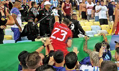 Locals and Argentinian fans fighting at the stadium 