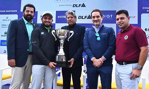 (From L-R) Uttam Singh Mundy, Varun Parikh, Kapil Dev, Vishesh Chandiok, Grant Thornton Bharat, and Tusch Daroga pose with the trophy at the press conference on Tuesday.